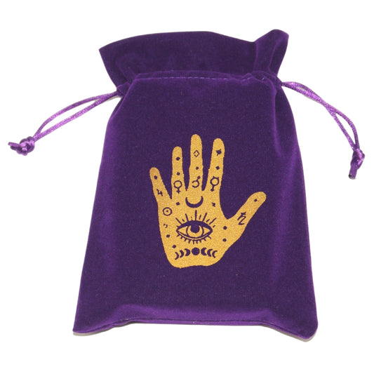 purple tarot bag with gold hand print with all seeing eye and moon phases