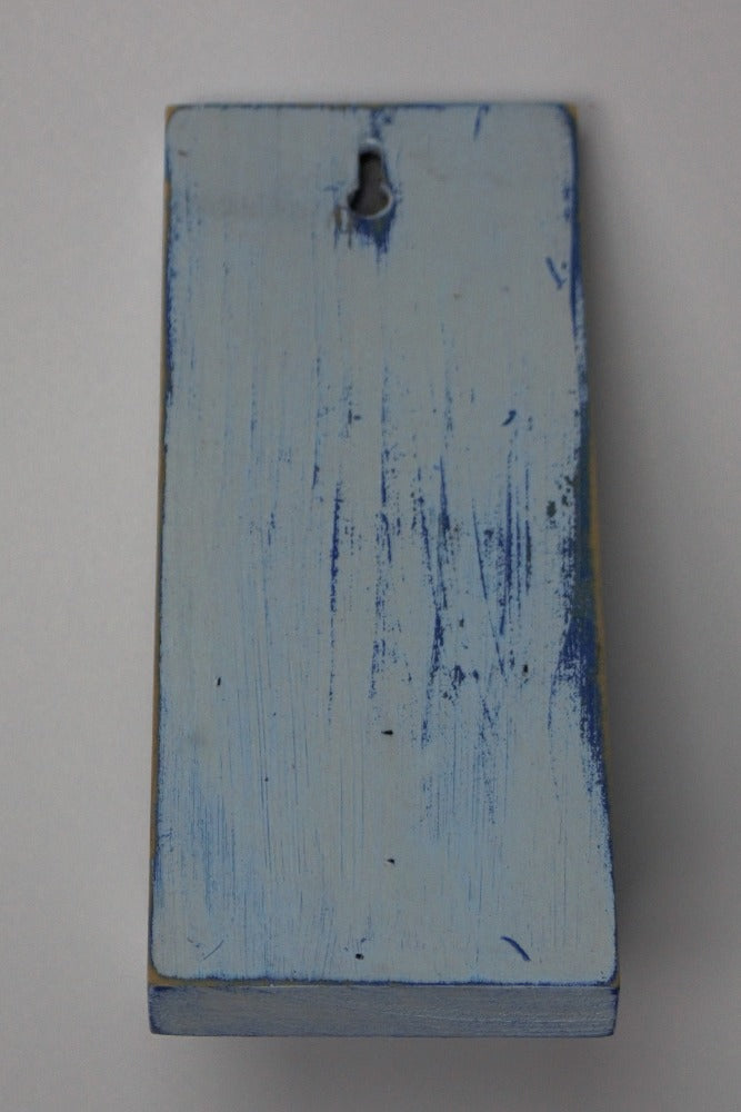 distressed blue and white wooden wall mounted candle or ornament shelf rear view showing keyhole for mounting